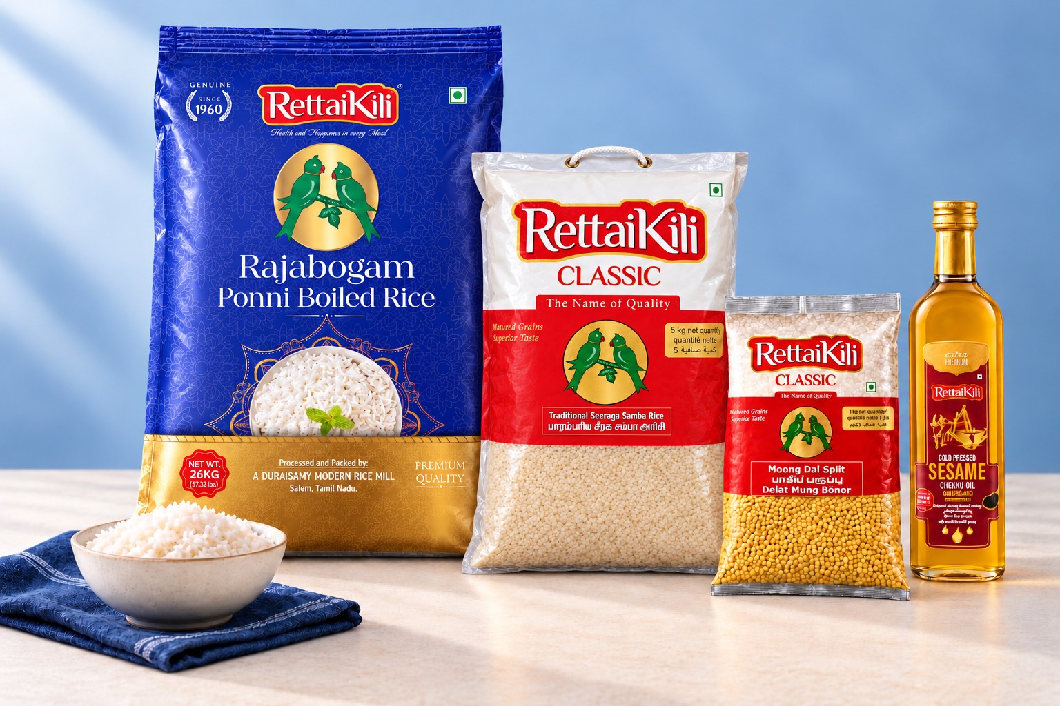 RettaiKili Rajabogam Ponni Rice, Traditional Seeraga Samba Rice, Moong Dal Split and sesame oil displayed beside a bowl of cooked rice